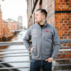 1-Sweatjacke-grau-StadtLand-Rot-Vorne.jpg